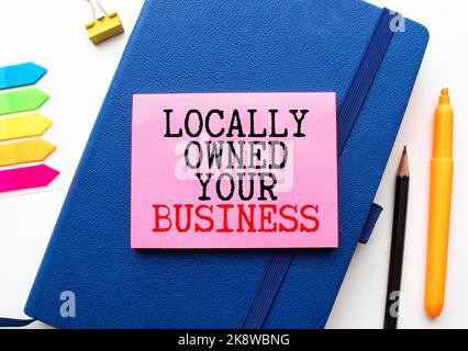 Handwriting Announcement text showing Small Business. Business concept for Family Owned Company written on sticky note paper wooden background. Equati Stock Photo