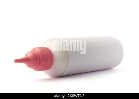 close-up of squeeze plastic bottle for glue, oil, lubricant, gel or chemical, mock-up template, resource for graphic designing, isolated on white Stock Photo