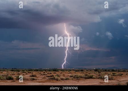 Lightning bolt from a monsoon thunderstorm over Casa Grande, Arizona Stock Photo