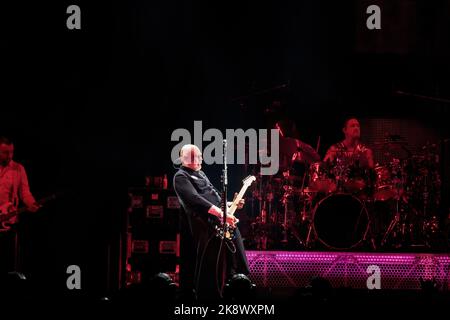 Toronto, Canada. 24/10/2022, Billy Corgan of Smashing Pumpkins plays guitar with Jack bates on the left and Jimmy Chamberlin on the right Stock Photo