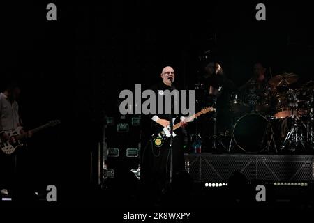 Toronto, Canada. 24/10/2022, Billy Corgan of Smashing Pumpkins plays guitar with Jack bates on the left and Jimmy Chamberlin on the right Stock Photo