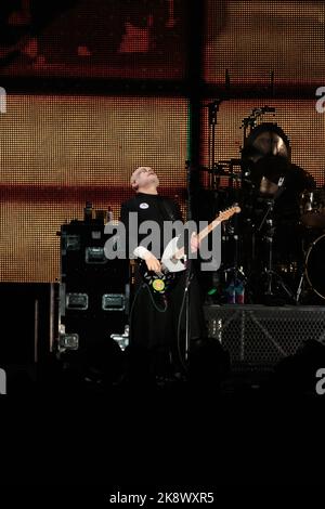 Toronto, Canada. 24/10/2022, Billy Corgan of Smashing Pumpkins performs on stage wearing dark eye makeup and a Freemason crest on his cloak Stock Photo