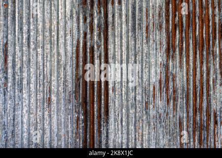Artistic of old and rusty zinc sheet wall. Vintage style metal sheet roof texture. Pattern of old metal sheet. Rusting metal or siding. Corrosion of g Stock Photo