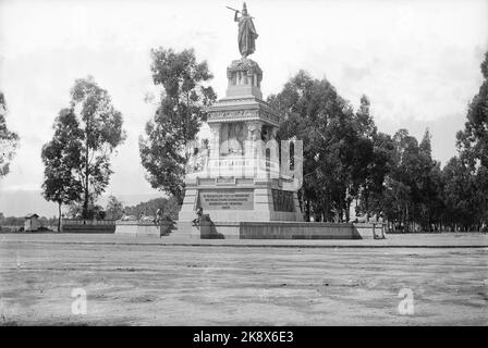 Vintage 19th century black and white photograph of the Monument to Cuauhtemoc, the last Aztec Emperor, in Mexico City, photo by William Henry Jackson Stock Photo