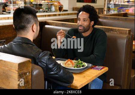 EDITORIAL USE ONLY General views of customers at a Morrisons Café as the supermarket teams up with Heinz Beanz to launch the 'Ask for Henry' free meals for all initiative, which will be available to the public from today. Issue date: Wednesday October 26, 2022. Stock Photo