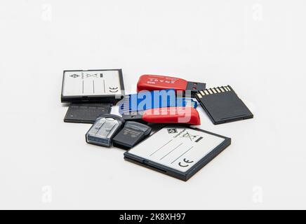 U S B sticks and photography memory cards isolated on a white background. Stock Photo