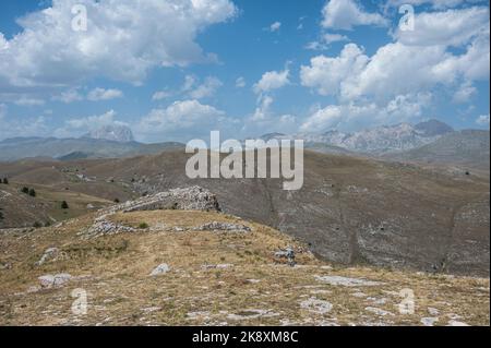 Panoramic view from Rocca Calascio on Campo Imperatore and the Gran Sasso massif Stock Photo