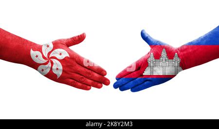 Handshake between Cambodia and Hong Kong flags painted on hands, isolated transparent image. Stock Photo