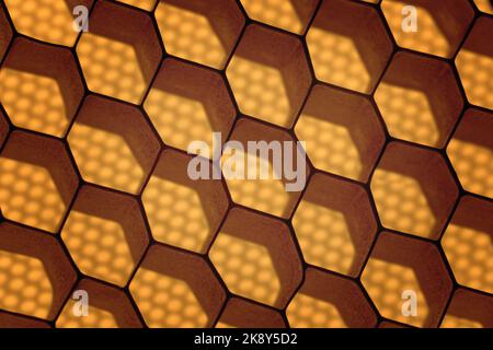 Abstract geometric background of hexagonal cells with yellow highlights. Stock Photo