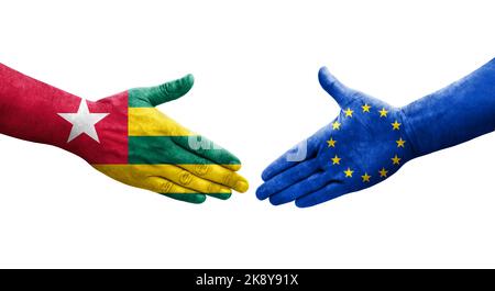 Handshake between European Union and Togo flags painted on hands, isolated transparent image. Stock Photo