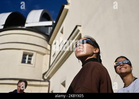 Prague, Czech Republic. 25th Oct, 2022. People watch a partial solar eclipse in the Stefanik Observatory, Prague, Czech Republic, October 25, 2022. Credit: Ondrej Deml/CTK Photo/Alamy Live News Stock Photo