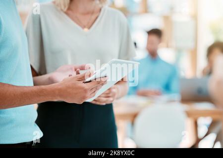 Business, tablet and manager with worker planning, organising or networking on digital device. Teamwork collaboration, man and woman working together Stock Photo
