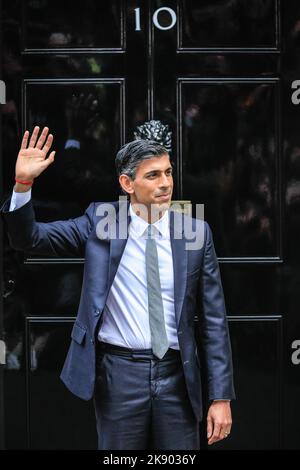 Prime Minister Rishi Sunak waving to members of the public as he visits ...