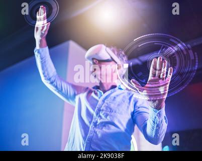 Hologram, metaverse and virtual reality with a senior man using a vr headset to access a ux or ui digital dashboard. Future, internet and user with a Stock Photo