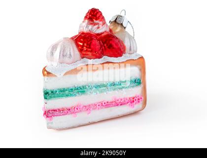 Christmas tree ornament in the shape of a layer cake. Stock Photo