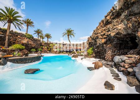 Amazing cave, pool, natural auditorium, salty lake designed by Cesar Manrique in volcanic tunnel called Jameos del Agua in Lanzarote, Canary Islands, Stock Photo