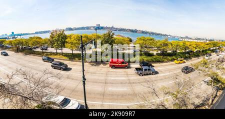 NEW YORK, USA - OCT 21, 2015: street view to 12th avenue and river Hudson river in the neighborhood Midtown in New York City, USA. Midtown  represents Stock Photo