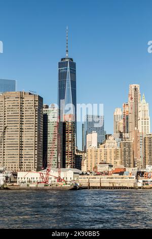 NEW YORK, USA - OCT 23, 2015: view to new skyscraper one World trade center from Brooklyn. The one world trade center is 541 m high. Stock Photo