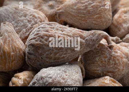 Sweet dried small spanish figs close up full frame as background Stock Photo