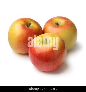 Three whole fresh ripe Kanzi apples isolated on white background Stock Photo
