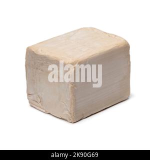 Single fresh yeast cube isolated on white background close up Stock Photo