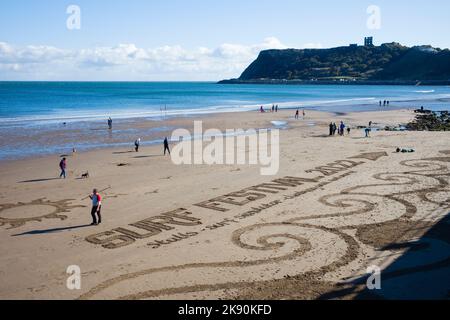 Sand sign for Scarborough surf festival 2022 at the North Bay Stock Photo