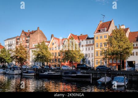 Copenhagen, Denmark - Sept 2022: Historical canal and waterfront houses with typical danish architecture in Christianshavn Neighborhood Stock Photo