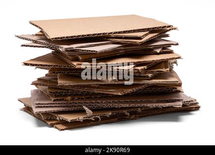 Cardboard Pieces Pile Cut Out on White. Stock Photo