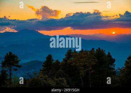 The sunset over the Himalayas mountain range captured from Nagarkot in central Nepal, Kathmandu valley Stock Photo