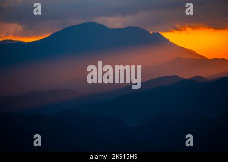 The sunset over the Himalayas mountain range captured from Nagarkot in central Nepal, Kathmandu valley Stock Photo