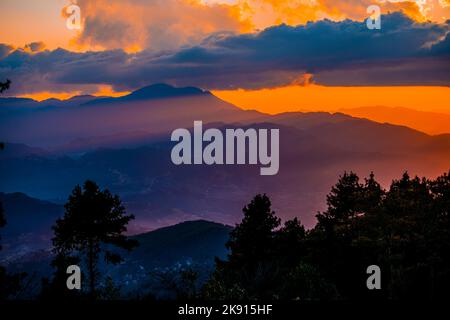 The sunset over the Himalayas mountain range captured from Nagarkot in central Nepal, Kathmandu valley Stock Photo