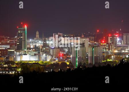 A view of Leeds City at night with Bridgewater Place & the town hall clock tower Stock Photo