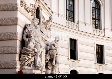 Colossus statues of Hercules on the outer side of the Michalertor at the Michaelerplatz in central Vienna, Austria. Stock Photo