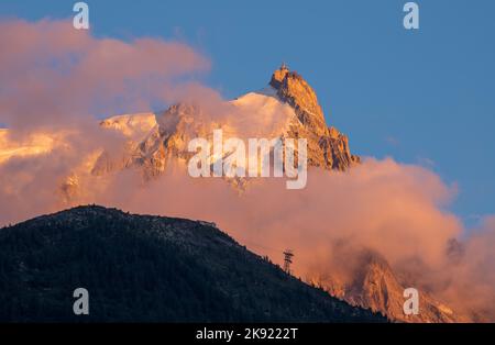 The peak Aiguille du Midi sunset light - Chamonix. Stock Photo