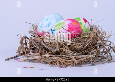 Graffiti filled Ester eggs in a nest Stock Photo