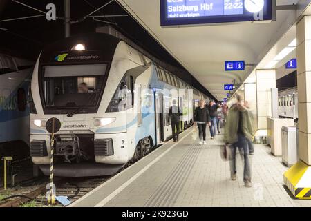 VIENNA, AUSTRIA - APR 25, 2015: people arrive at the Westbahnhof in vienna. Trains from the Westbahn stop at the Wien Westbahnhof railway station in V Stock Photo