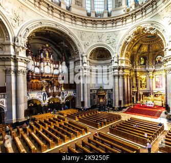 BERLIN, GERMANY - MAY 2, 2016:  people visit the Berliner Dom from inside. the dome is the biggest church in Berlin and the center of protestand relig Stock Photo