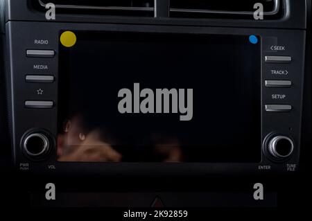 Close up black multimedia panel in modern car Stock Photo