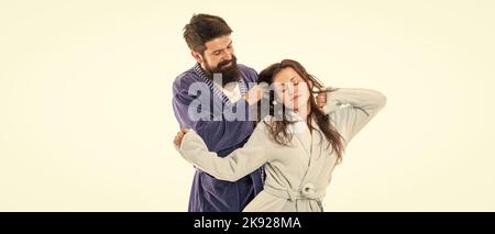 Good morning. Man hold hair of sleepy woman. Family couple in love. Wake up. Early morning Stock Photo