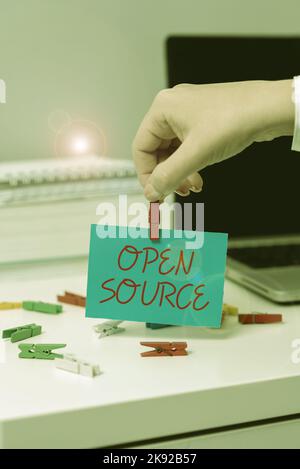 Text caption presenting Open Source. Business showcase contains the source code that can be modified and enhanced Stock Photo