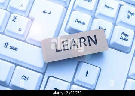 Conceptual caption Learn. Word for process of acquiring new modifying existing knowledge behaviors Stock Photo