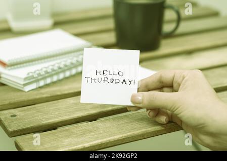 Text sign showing Hello Thursday. Word for a positive message as the Friday s is herald passes by Stock Photo