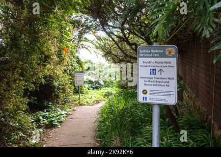 A sign for the Bondi to Manly Walk at the southern end of the Hermitage Foreshore Walk in Vaucluse, Sydney, Australia Stock Photo