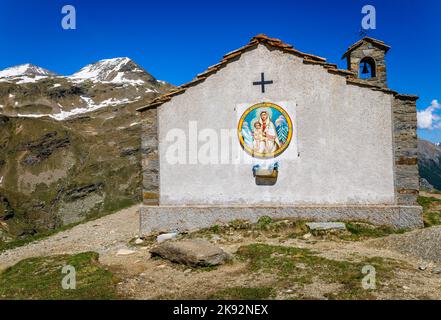 Chapel church above Idyllic Dolomites Alpine landscape, Gran Paradiso, Italy Stock Photo