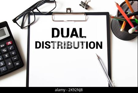 text Dual Distribution on white paper, business concept Stock Photo - Alamy