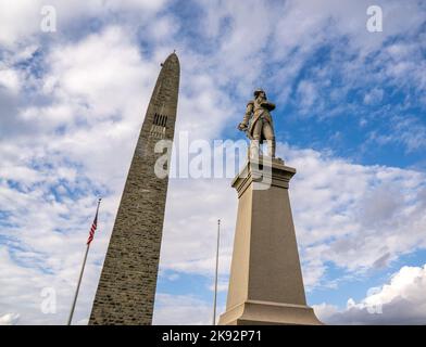 Bennington, VT - USA - Oct 10, 2022 View of the Statue of Seth Warner in front of Bennington Battle Monument. The monument commemorates the Battle of Stock Photo