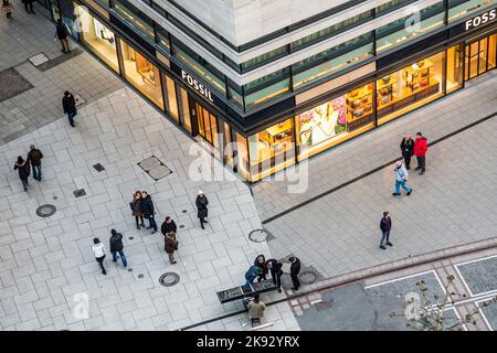 FRANKFURT, GERMANY - FEB 22, 2015: people walk along the Zeil in late afternoon in Frankfurt, Germany.  The Zeil is a very famous and old pedestrial z Stock Photo