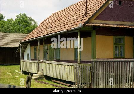 Harghita County, Romania, approx. 2002. Traditional simple old country house. Stock Photo