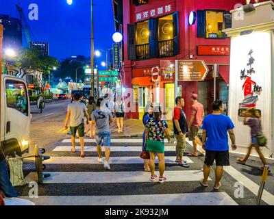 SINGAPORE, SINGAPORE - AUG 12, 2015: chinese people go eating in the evening in chinatown in Singapore . In 2014, 74 percent of the  Singapore populat Stock Photo