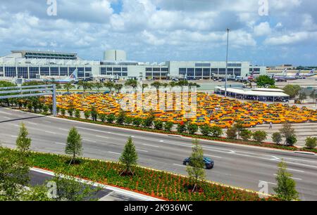 MIAMI, USA - AUGUST 31, 2014: Miami international Airport in Miami, USA. Many taxis wait for passengers. They need a special licence to serve the airp Stock Photo